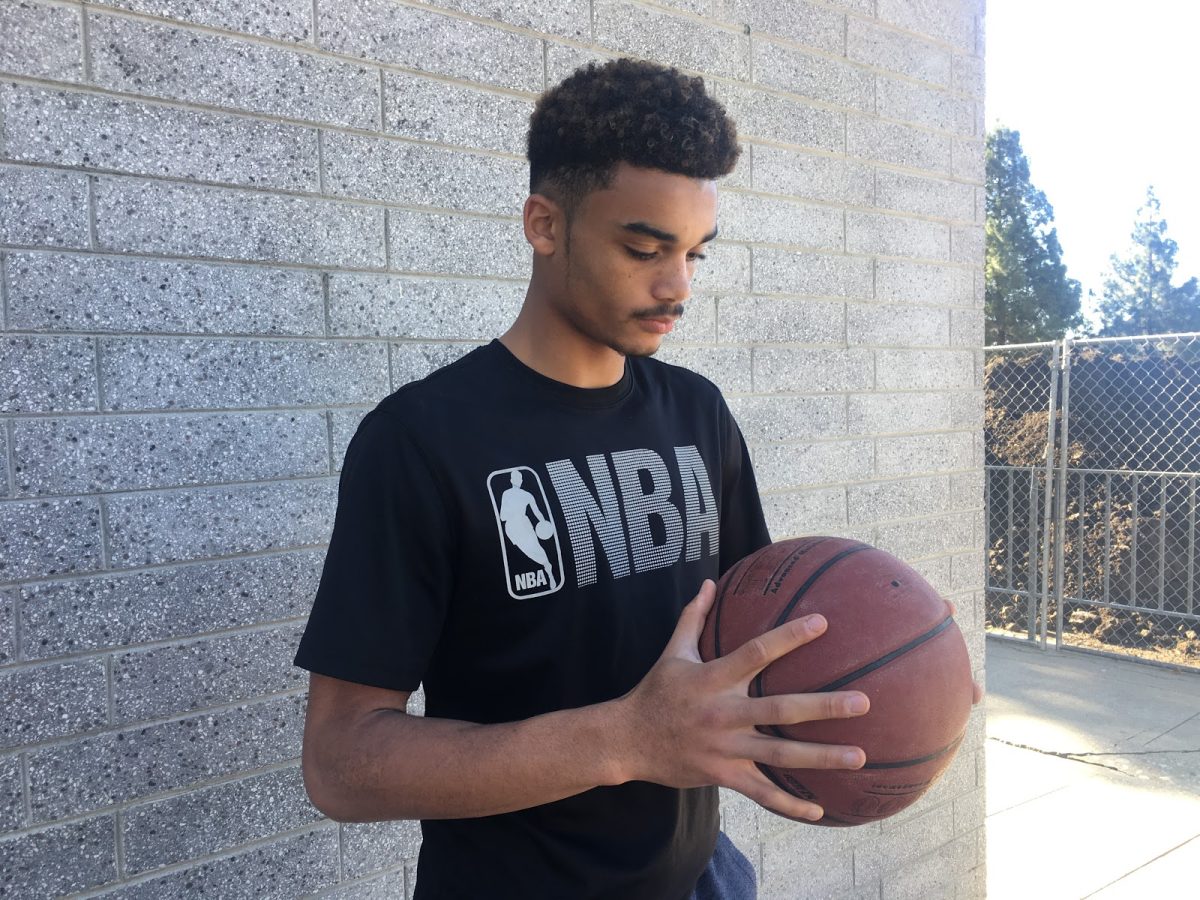 Freshman Assani Berkeley: A Look at Boys Basketball