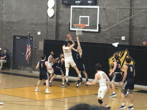 Boys Basketball Clutches up against Mission